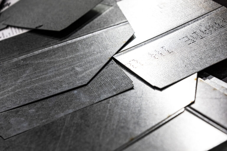 Precision-cut sheet metal blanks used in the fabrication of custom rectangular ductwork and fittings at DuctWorx, ensuring dimensional accuracy and high-performance HVAC solutions.