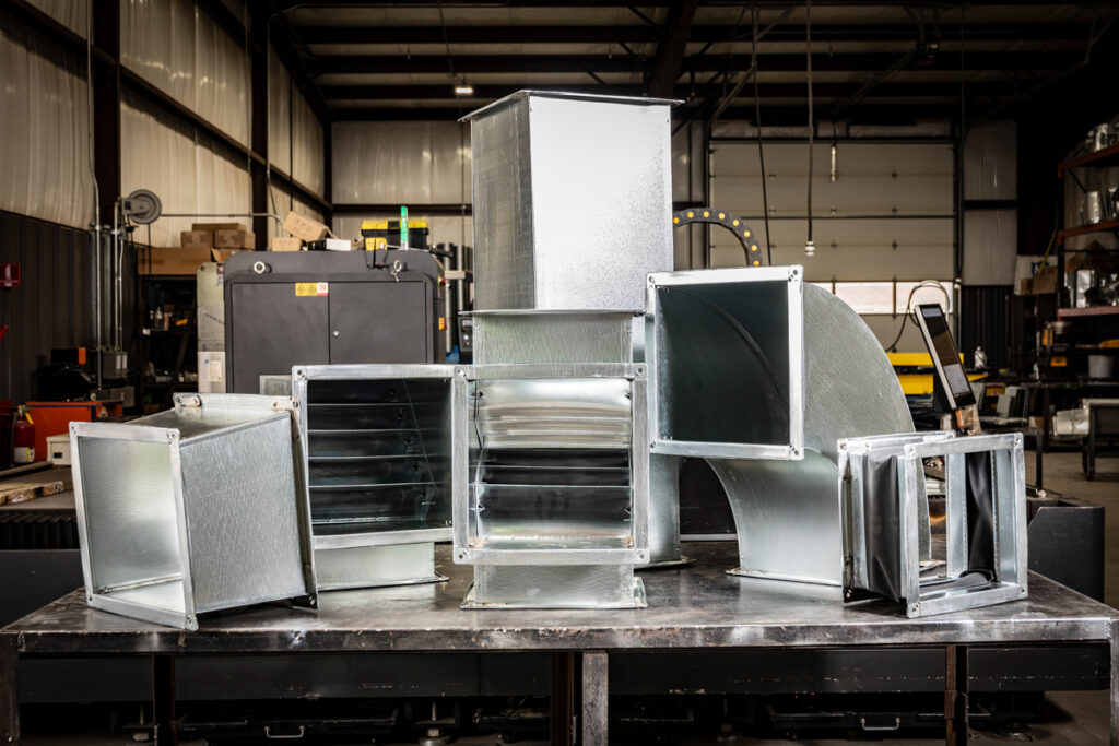 Custom-fabricated rectangular ducts and fittings from DuctWorx, including elbows, plenums, transitions and vibration isolators—engineered for seamless, space-saving HVAC duct installation.
