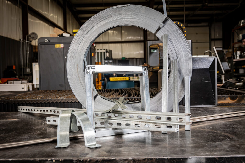 Essential HVAC hardware from DuctWorx, including duct connectors, Unistrut, hangers, and galvanized strap—engineered for airtight duct installation and stable system support.